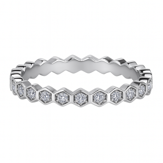 Silver ring with diamond accents on a white background
